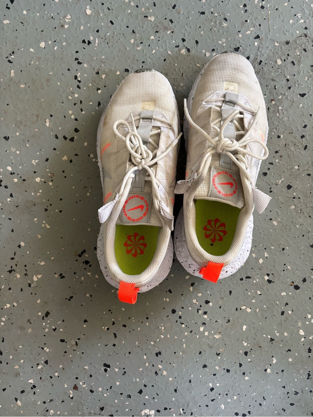 White and Neon Orange Athletic Shoes